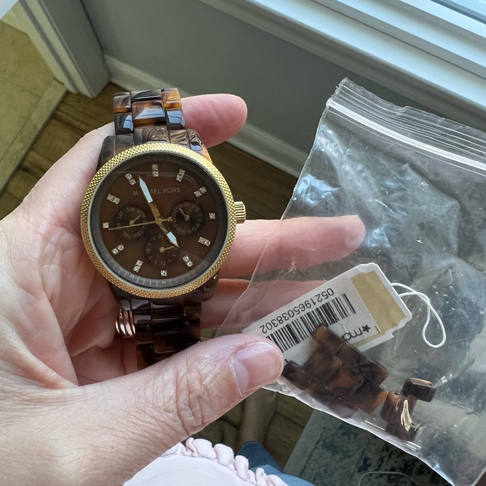 Michael Kors tortoise shell and gold watch.